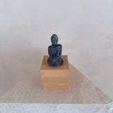 Female Figure on Wooden Plinth